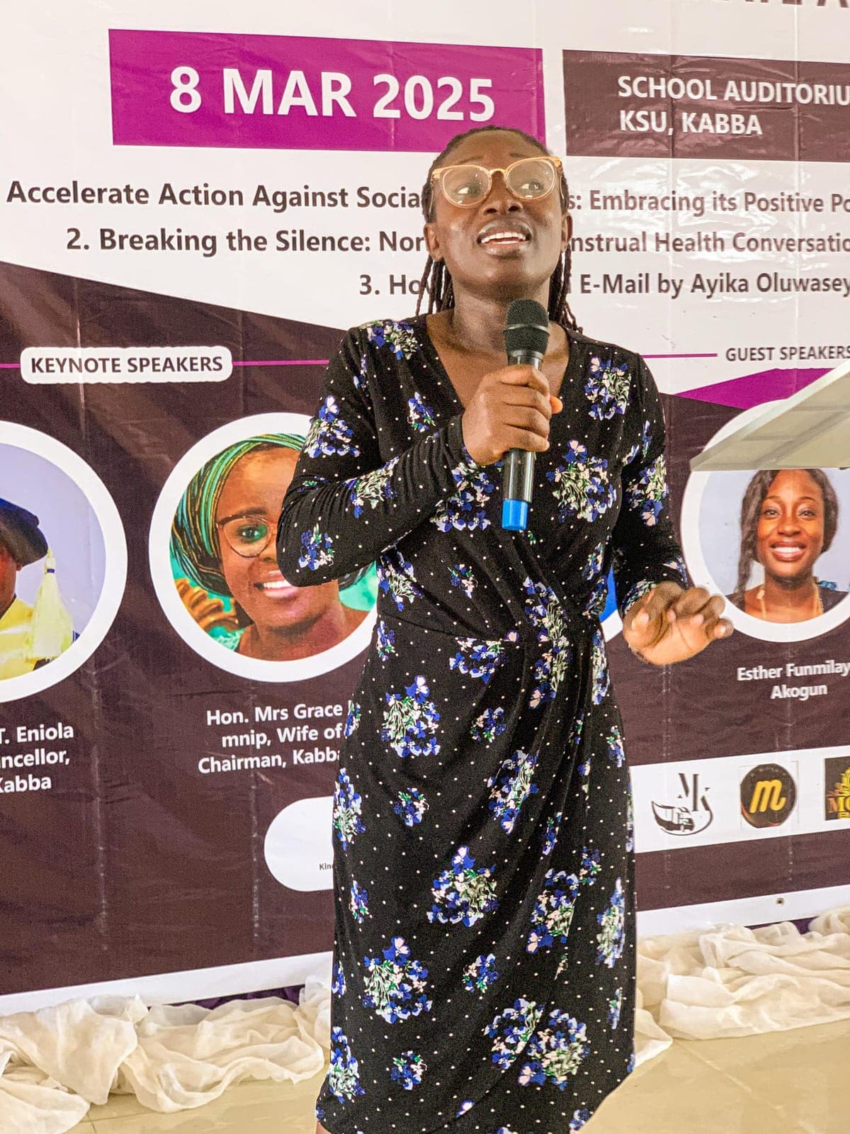 A speaker presenting at the Women's Day program