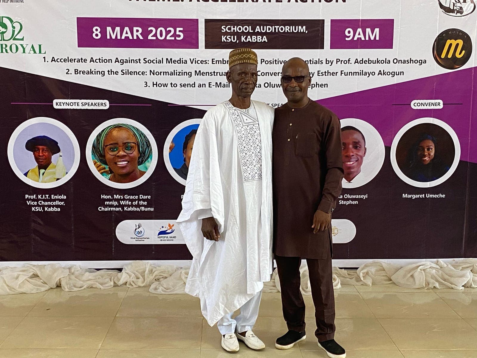 Guests in front of the Women's Day 2025 banner