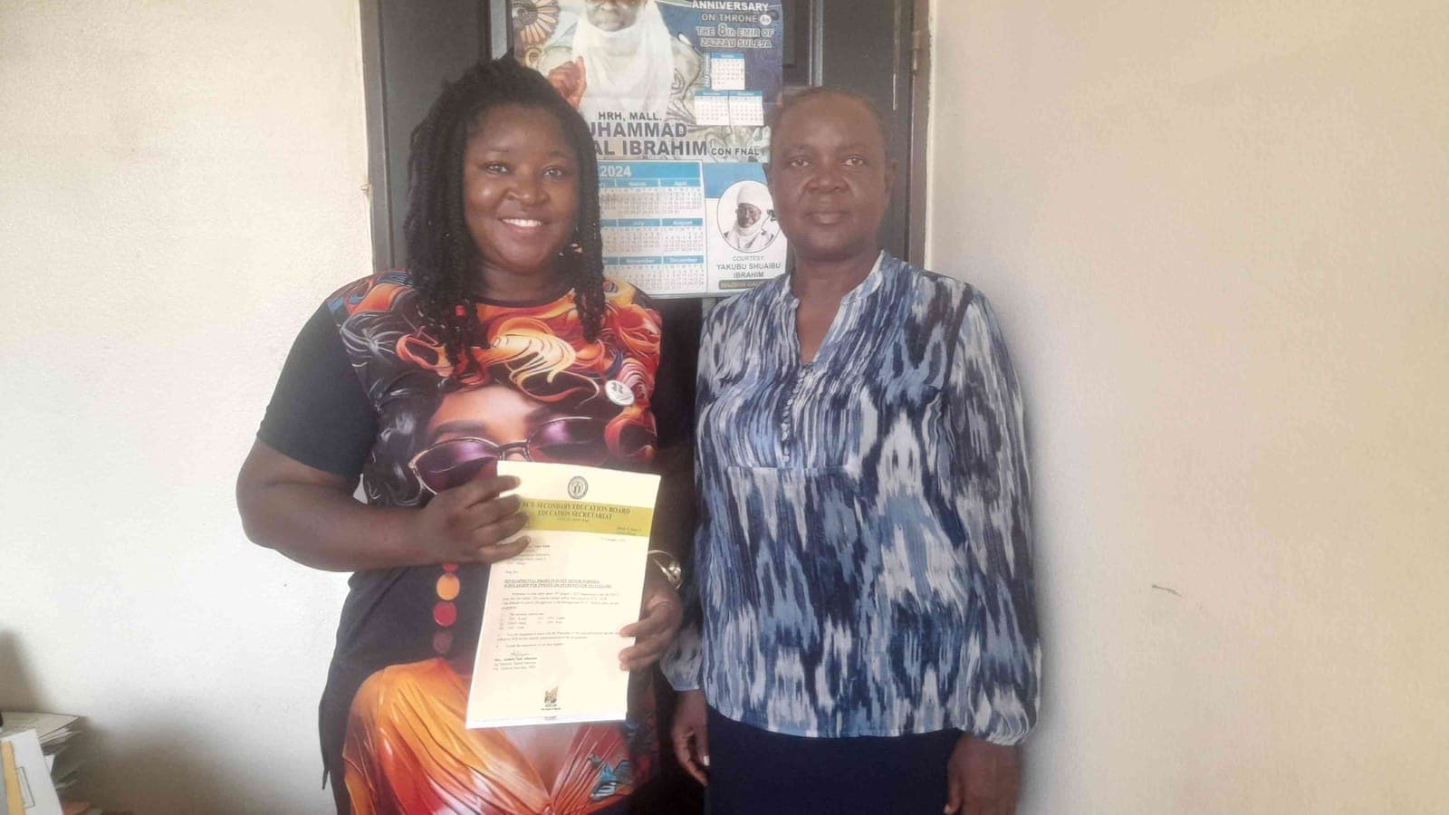 A certificate presentation during the KHI Scholarship program
