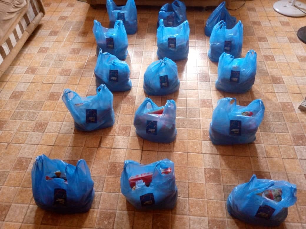 Rows of packed food bags ready for distribution